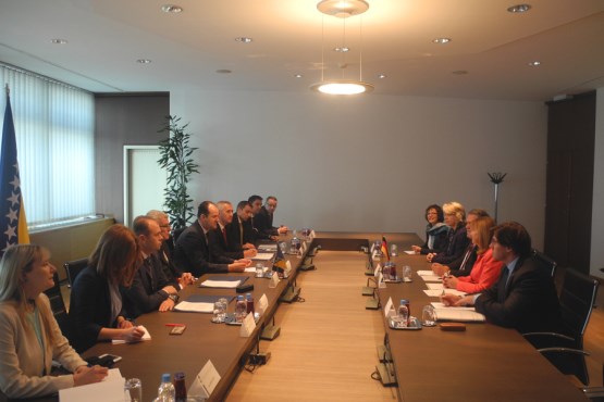 Members of the Collegium of the House of Peoples and the House of Representatives of the Parliamentary Assembly of BiH talk with the German Delegation